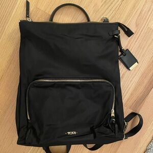 Tumi Black Backpack with Gold Zippers